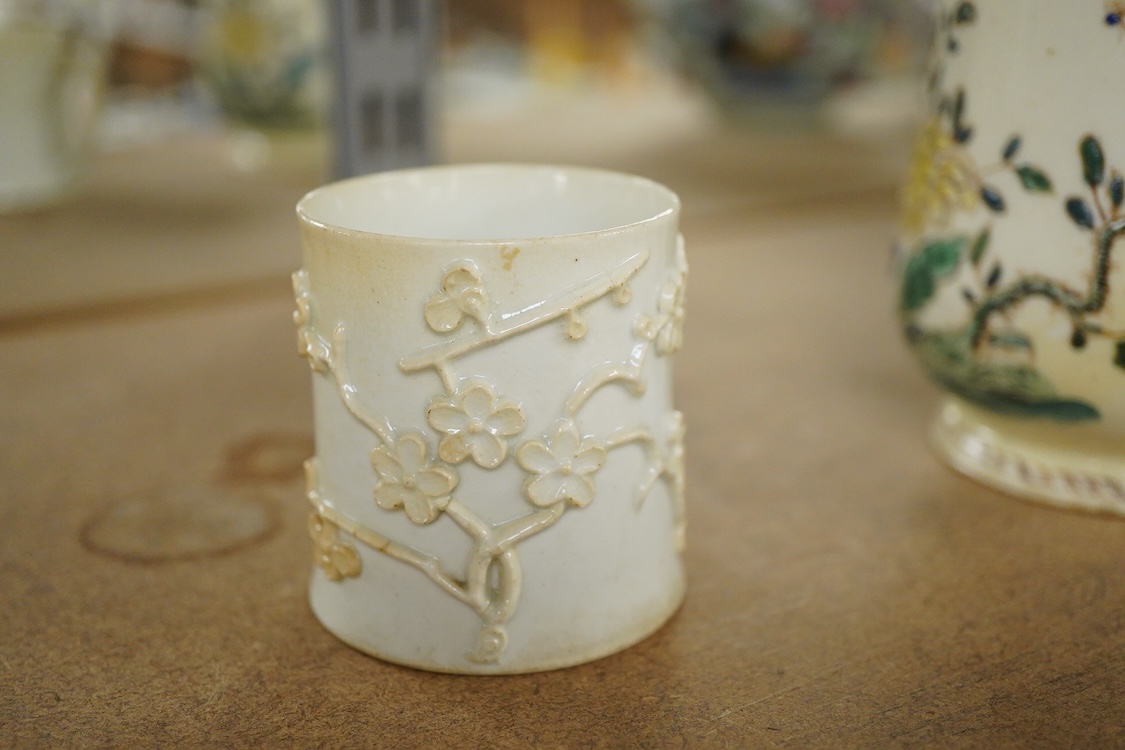 A Bow polychrome mug - 11.5cm high and a Bow prunus sprigged coffee can, c.1760-70